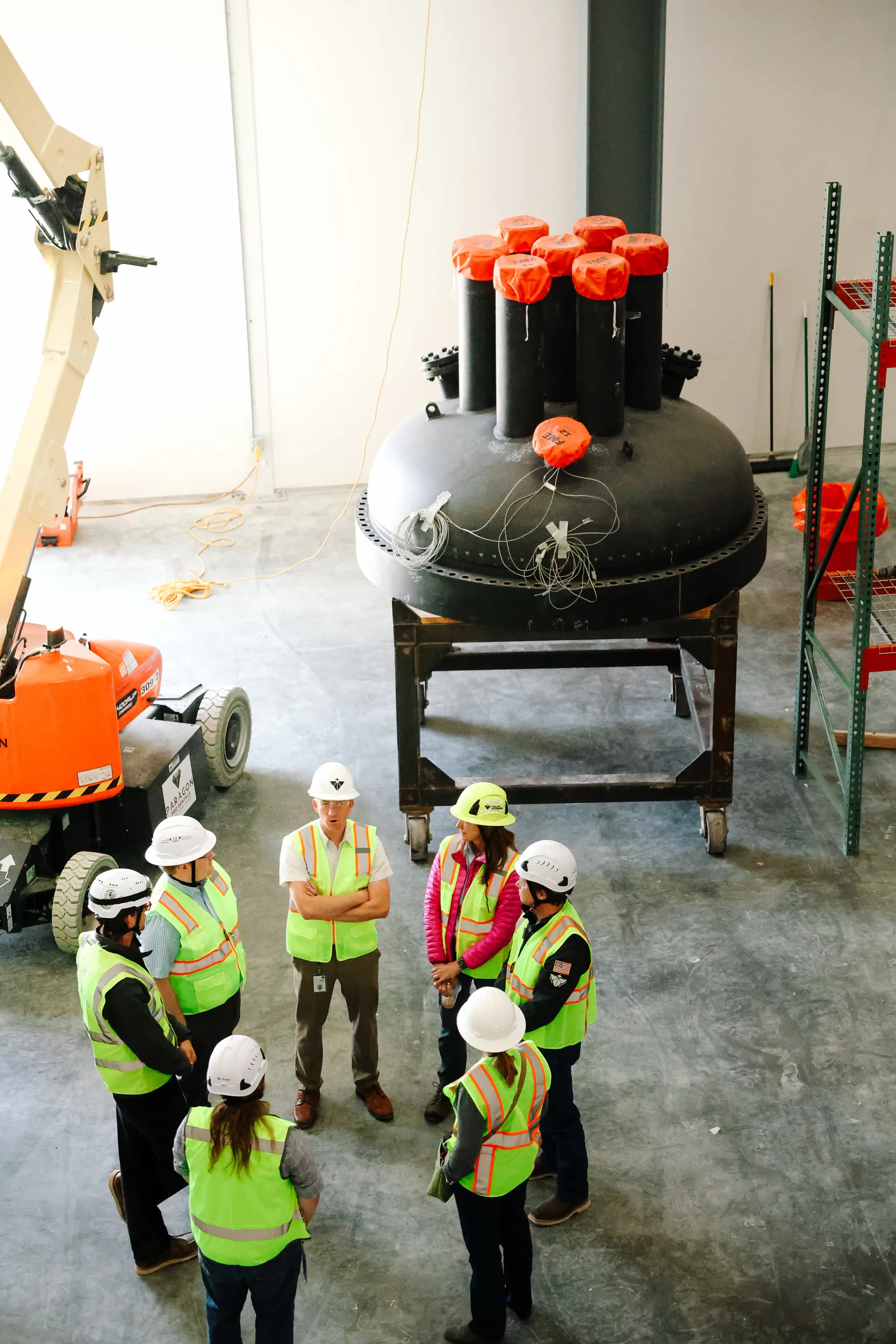 Tour group gathered around the reactor vessel